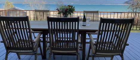 Deck with Mission Mountain views. Lakeside dining space. 