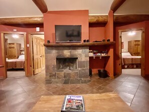 Wood burning fireplace & flat screen TV