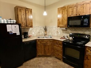 Full kitchen with dishwasher