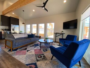 Step into comfort at Timber + Tin B! This inviting living room welcomes you to your private Kanab retreat.