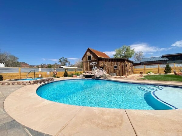 Your Kanab adventure awaits at Timber + Tin B! This 1BR/1BA haven offers relaxation by the pool, movie nights in a restored barn, and endless fun in a private resort community located in the heart of town.