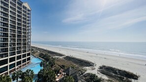 View of the beach from your balcony.