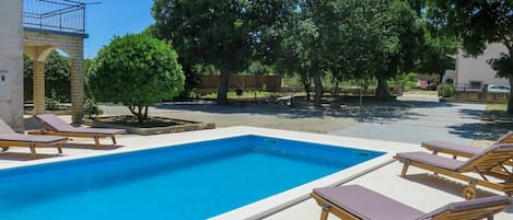 Water, Property, Sky, Plant, Swimming Pool, Tree, Azure, Shade, Outdoor Furniture, Building