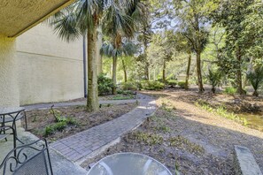 Deck View - ground level deck with path to the pool