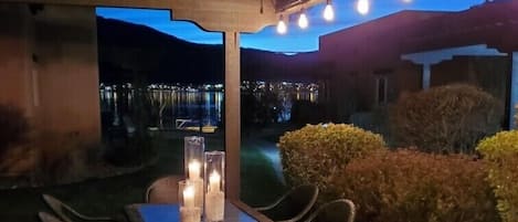 Patio view at night. Smooth lake, soft music and great company. 