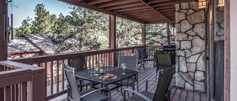 Savor the Mountain Air - Furnished with outdoor seating, Pinon Park B22's covered deck is a great place to shake off real-world stress and just “be.”