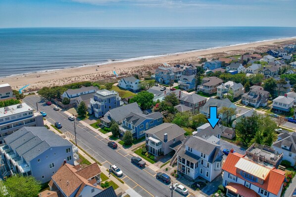 Sixth house from the beach.