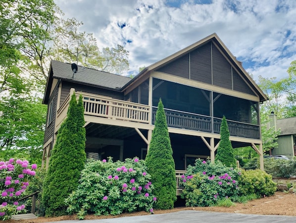 Large porches overlooking the beautiful landscape on 14 Trillium Links Cashiers