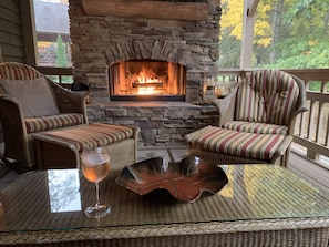 Screened in outdoor fireplace for those relaxing times with friends and family.