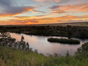 Enjoy picturesque sunsets overlooking the River. 