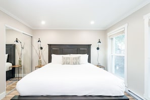 The King bedroom is located at the rear of the unit overlooking a courtyard.