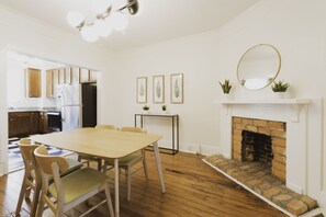 The dining room has a dining table and seating for four.