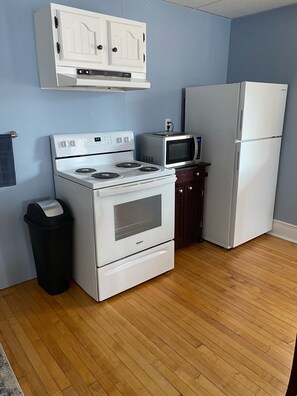 Brand new stove, refrigerator & microwave.