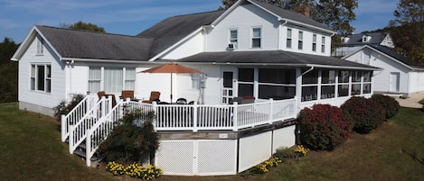 Spacious decks, screened porch, and large living spaces await you.