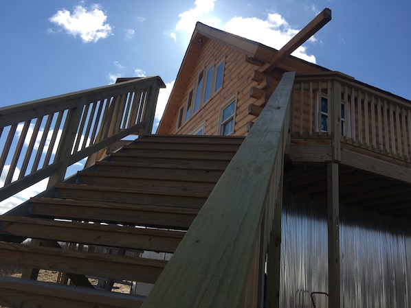 These stairs bring one up to the deck and the Main floor of the cabin.