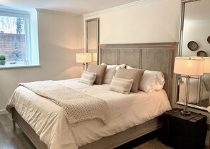 King Bedroom with comfortable luxury mattress and Sonos system. Lots of light!