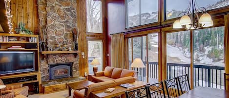 Floor to ceiling windows let the views stream into the living area