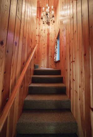 Alongside the living room are the stairs to the second floor