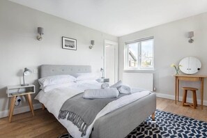Third bedroom with double bed and ensuite bathroom.