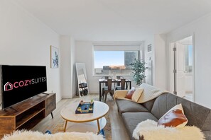 A stylish and modern 2BR/3BA beachfront CozySuites await you!