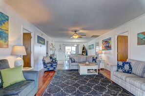 This comfy living room offers space for everyone to gather!