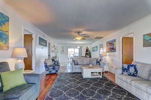 This comfy living room offers space for everyone to gather!