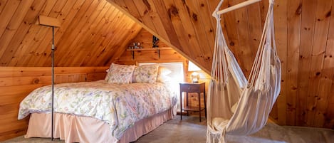 Queen size bed in the Eagle Nest