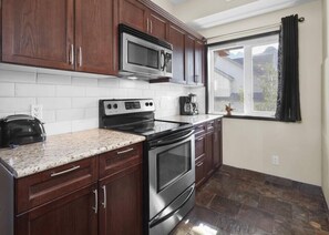 Modern style kitchen with window.
