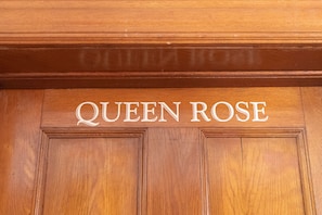 The door to the Queen Rose room.