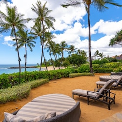 Take in the beauty on the private beach fronting the beach bar