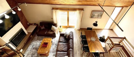 Large chalet style living and dining room. 