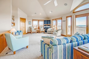 The top level great room features breathtaking unobstructed oceanfront views and a home theater system.