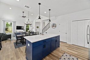 View from the kitchen into the dining and living area