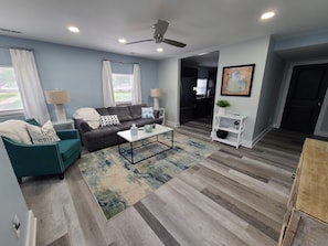 Open concept living room to the kitchen