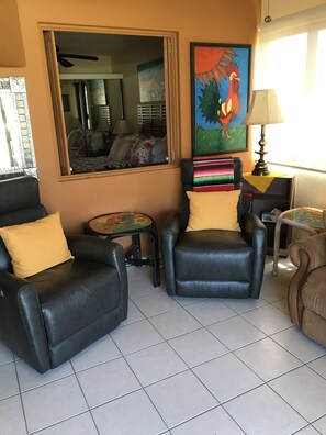 2 leather reclining chairs