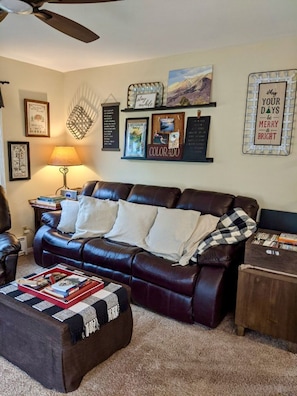 Living Room; ottoman makes into twin cot 