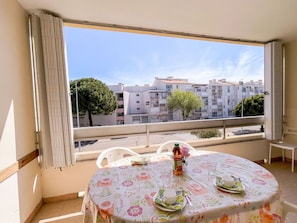 Table, Furniture, Property, Building, Tableware, Window, Sky, Chair, Decoration, Textile