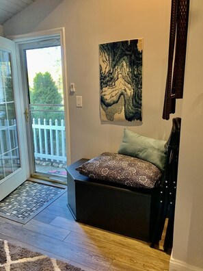 Lovely window/door looks out on the perennial garden and front lawn.