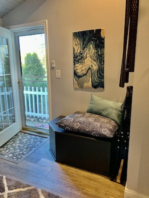 Lovely window/door looks out on the perennial garden and front lawn.