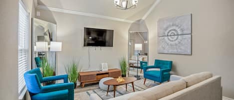 Elegant design with the neutral color scheme and pops of blue 