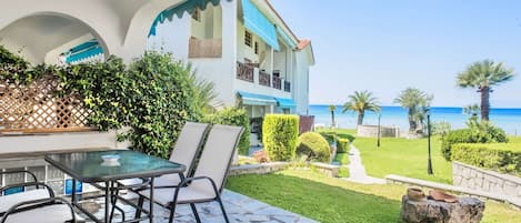 Outdoor dining area and sea view