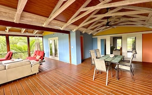 screened deck living and dining areas