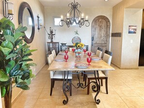 Magnificent granite dining table with comfortable seating for six.