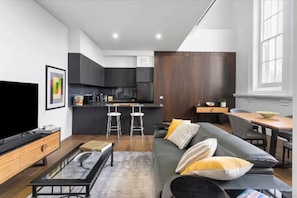 A spacious open plan living allows for comfort while enjoying this beautiful restoration