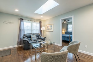 Living 1 has lots of natural light with skylight