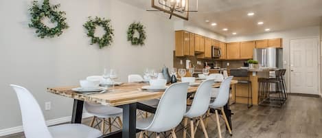 Beautiful open concept kitchen/dining area with seating for 12