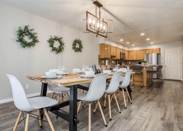 Beautiful open concept kitchen/dining area with seating for 12