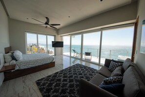 Large master suite with 2 person jacuzzi on patio.