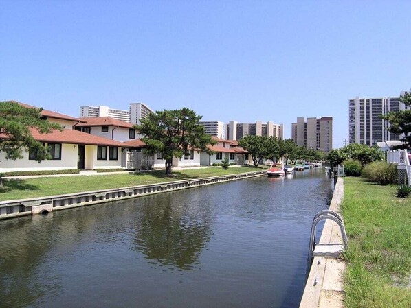 Canal with shared boat docking access, only a few feet away from the unit.