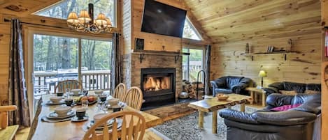 Leaving room with wood-burning fireplace